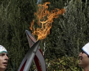У Росії спалахнув олімпійський факелоносець (+відео) У Росії спалахнув олімпійський факелоносець (+відео)