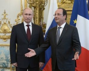 Путин и Олланда попозировали камерам и ушли за дверь (ФОТО) Путин и Олланда попозировали камерам и ушли за дверь (ФОТО)
