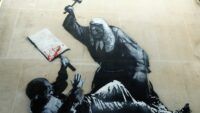 графіті Бенксі прибрали зі стіни суду